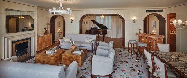 Dining area and living room area at The Mews Terrace Suite